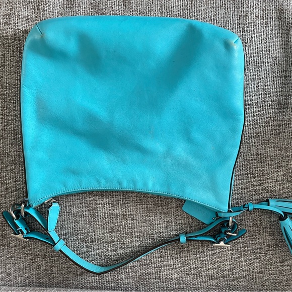 Bright blue-turquoise Coach hobo style bag with shoulder strap. - Picture 2 of 4